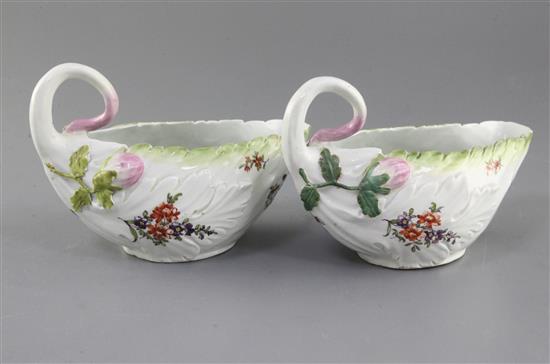 A pair of Derby leaf-moulded sauceboats, c.1758, l. 18.5cm, losses to leaves